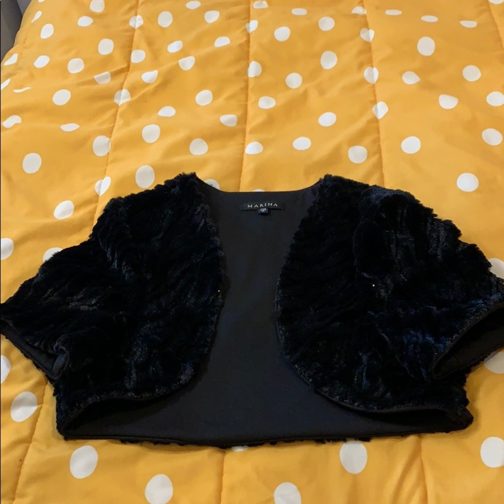 Marina size medium children’s faux fur shrug.